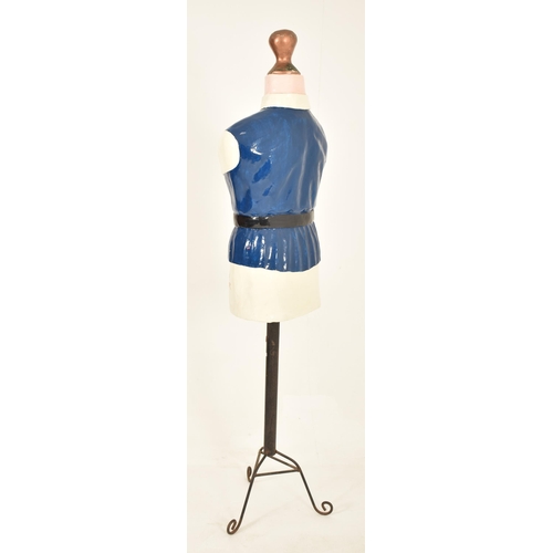 23 - A vintage 20th century painted fiberglass torso shop display / point of sale mannequin. The mannequi... 