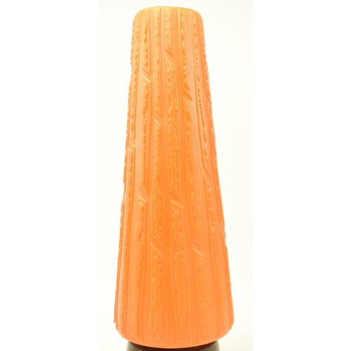 231 - A vintage mid century circa 1960s tiki style table lamp. The lamp featuring plastic orange shade wit... 