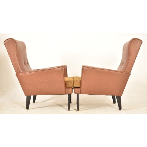 232 - A retro 20th century faux tan brown leather sofa suite. The suite comprising a two seater sofa sette... 