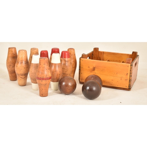 296 - A complete set of vintage early to mid 20th century carved wood & hand painted pub bowling pins / sk... 