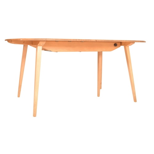 40 - Lucian Ercolani for Ercol - Grand Plank - A large retro mid 20th century beech and elm extending din... 
