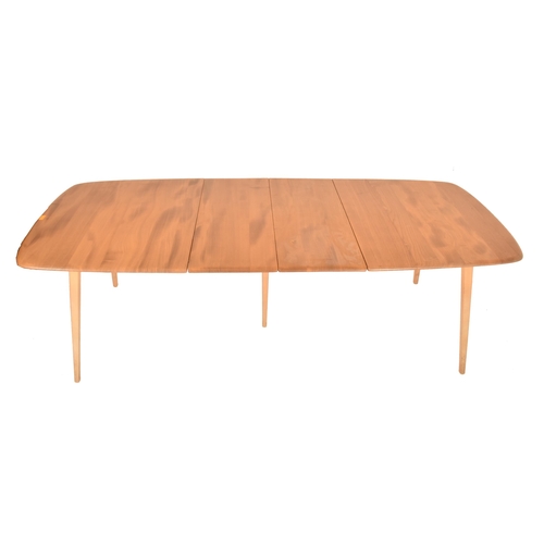 40 - Lucian Ercolani for Ercol - Grand Plank - A large retro mid 20th century beech and elm extending din... 