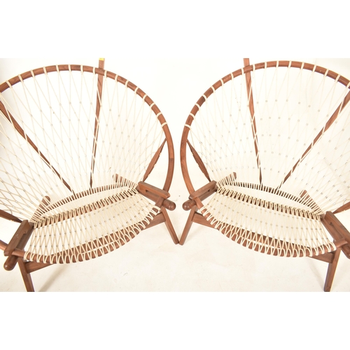 43 - After Hans J Wegner for PP Mobler - Model PP-130 - A pair of high end designer circle chair / lounge... 