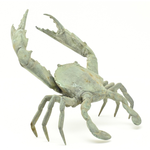 48 - A vintage 20th century patinated-bronze / brass sculpture of a crab in Japanese style. The crab with... 