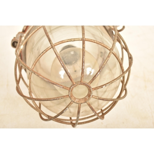58 - A retro 20th century oversized large Industrial bulkhead pendant lamp light. The light having a meta... 