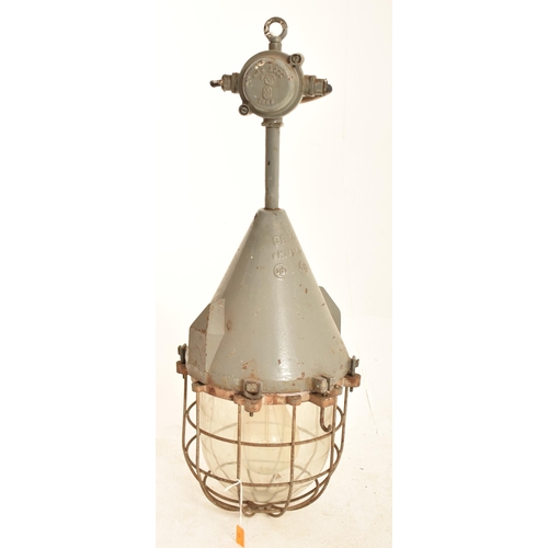58 - A retro 20th century oversized large Industrial bulkhead pendant lamp light. The light having a meta... 