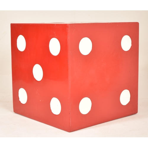64 - An oversized  vintage 20th century fibreglass floor-standing dice shaped occasional low table. The d... 