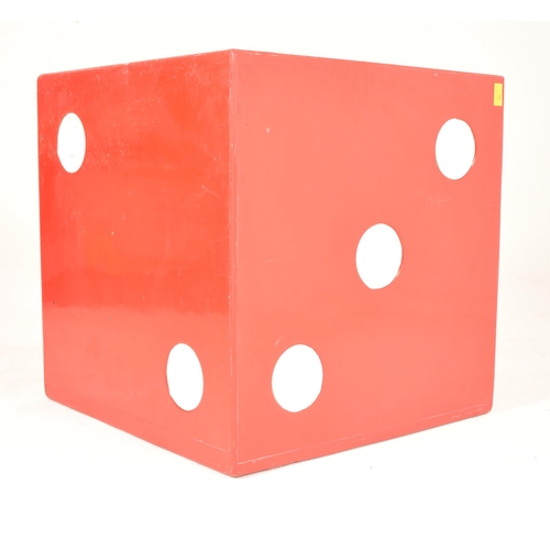 64 - An oversized  vintage 20th century fibreglass floor-standing dice shaped occasional low table. The d... 