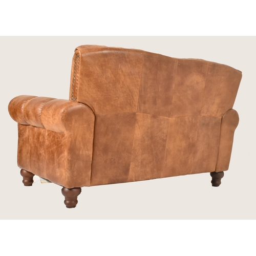 65 - British Modern Design - A retro 20th century brown leather two seater sofa settee. The sofa having a... 