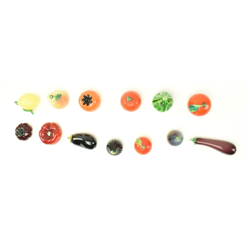 71 - Murano - A collection of mid 20th century hand blown glass fruits. The fruit comprising three orange... 