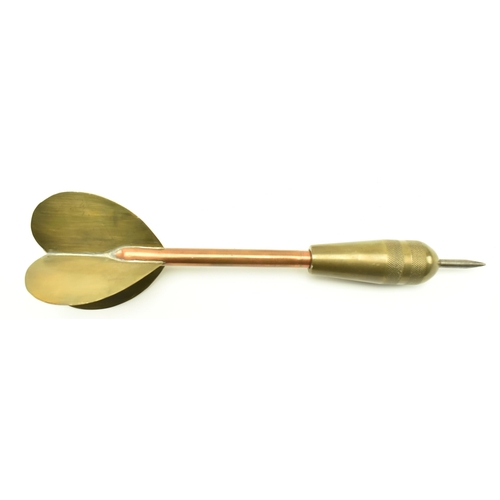 78 - A vintage 20th century brass and copper oversized darts award trophy. The trophy depicting a dart pr... 