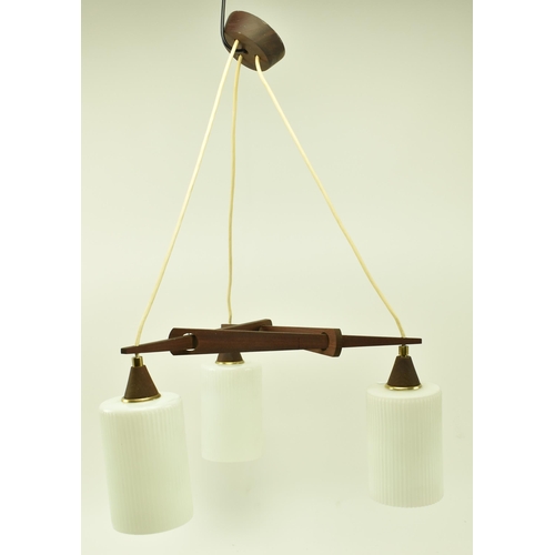 81 - A vintage Danish style mid 20th century teak and frosted glass three branch pendant ceiling light. T... 