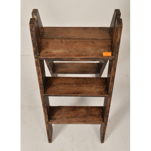 91 - A vintage early - mid 20th century folding rustic country style wooden step ladder. The ladder with ... 