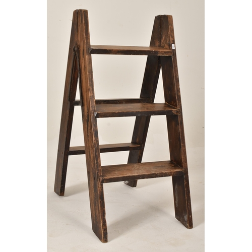 91 - A vintage early - mid 20th century folding rustic country style wooden step ladder. The ladder with ... 