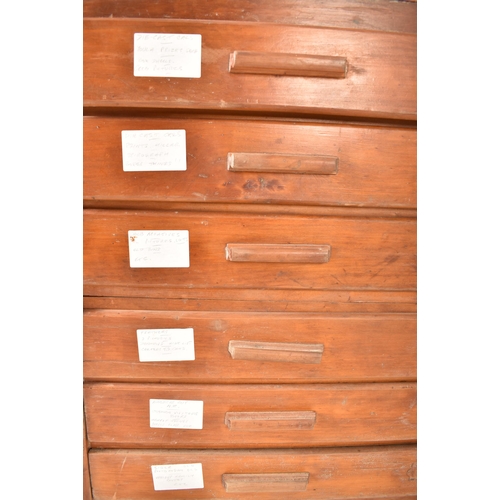 98 - A vintage mid 20th century oak and ply architects / artist's plan chest. The chest having a bank of ... 