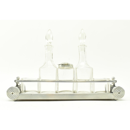 112 - An Art Deco 20th century circa 1930s chrome metal & glass condiment set on tray. The set comprising ... 
