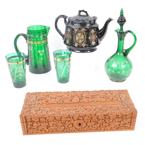 11 - A 19th century bohemian green glass decanter with stopper, with matching handle jug and two drinking... 