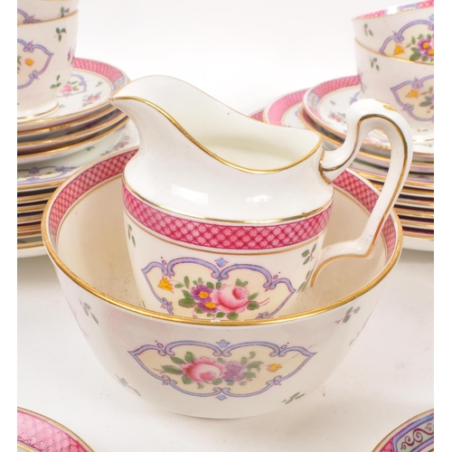 111 - Staffordshire - A early 20th century porcelain china tea service set. Comprising of cups, saucers, p... 