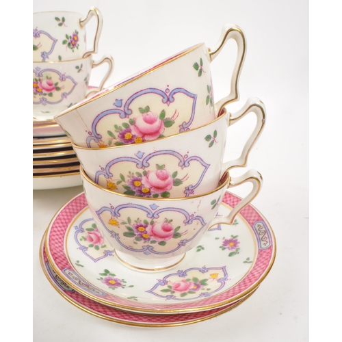 111 - Staffordshire - A early 20th century porcelain china tea service set. Comprising of cups, saucers, p... 