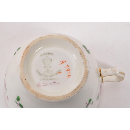 111 - Staffordshire - A early 20th century porcelain china tea service set. Comprising of cups, saucers, p... 