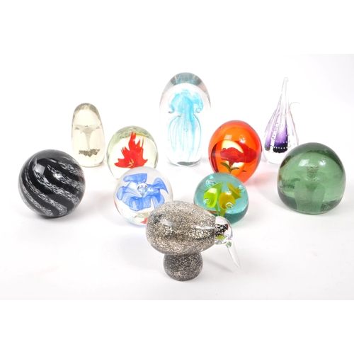 112 - A large collection of 20th century studio art glass paperweights. The collection to include ten exam... 