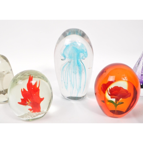 112 - A large collection of 20th century studio art glass paperweights. The collection to include ten exam... 