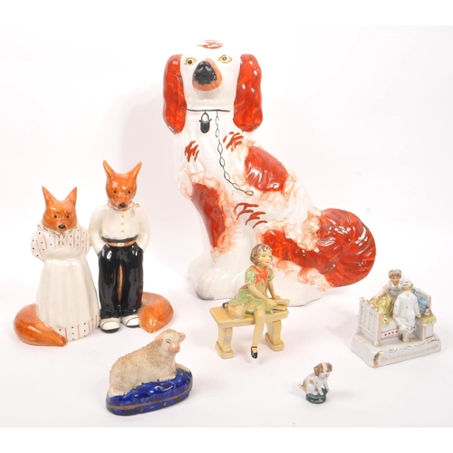 113 - A collection of Victorian and later china ceramic figures. The collection to include a small Staffor... 