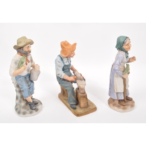 114 - A collection of three mid 20th century Capodimonte manner ceramic bisque figurines. The collection t... 