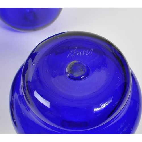 118 - Bristol Blue Glass - A collection of 20th Century Bristol Blue Glass items comprising of a tall 'tru... 