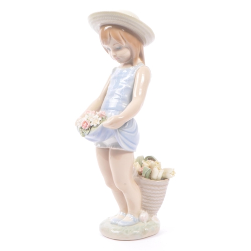 13 - Lladro - A collection of two 20th century Lladro porcelain figures. The collection to include ' the ... 