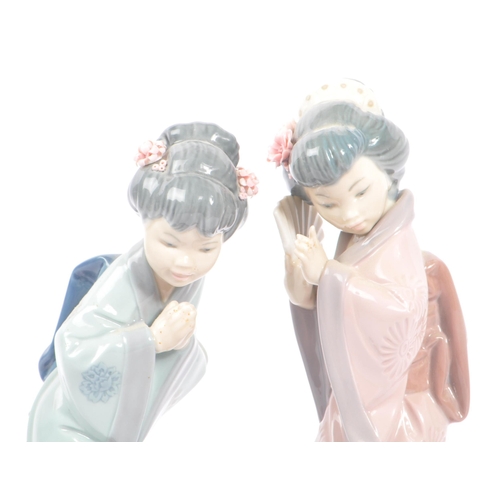 14 - Lladro - Two 20th century Lladro porcelain figures. The collection to include no.4999 Chrysanthemum ... 