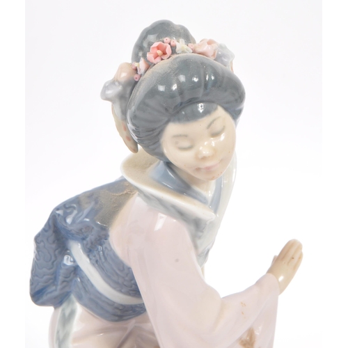 18 - Lladro - Two 20th century Lladro porcelain figures. The collection to include no.1447 Michiko and no... 