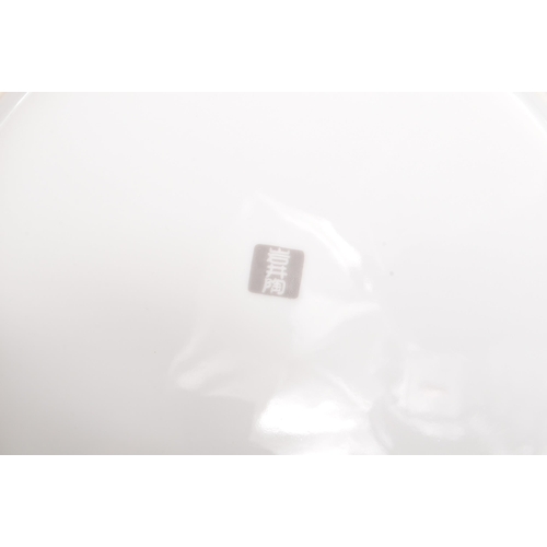 183 - Fukagawa Koransha - A pair of Japanese Fukagawa Koransha decorative china wall plates, alongside two... 