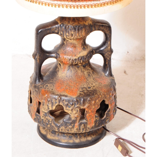 184 - West German Pottery - A mid 20th century West German pottery lamp base. The lamp base having a brown... 
