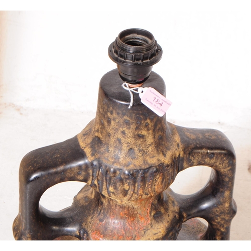184 - West German Pottery - A mid 20th century West German pottery lamp base. The lamp base having a brown... 