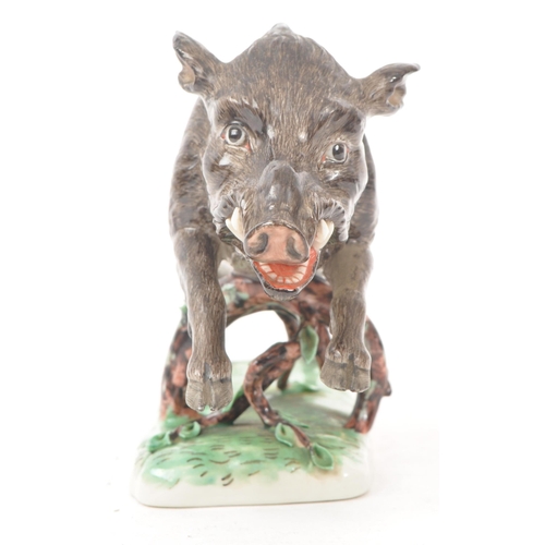 185 - Nymphenburg - After Frankenthal - An early 20th century Nymphenburg Model 1689 porcelain figure of a... 