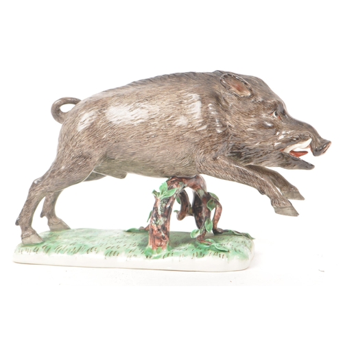 185 - Nymphenburg - After Frankenthal - An early 20th century Nymphenburg Model 1689 porcelain figure of a... 