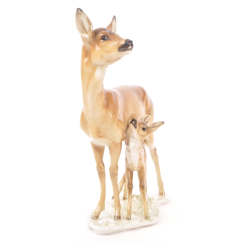 186 - Hutschenreuther - A mid 20th century Hutschenreuther porcelain deer figurine. The figure depicting a... 