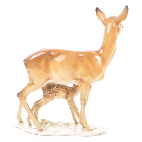 186 - Hutschenreuther - A mid 20th century Hutschenreuther porcelain deer figurine. The figure depicting a... 