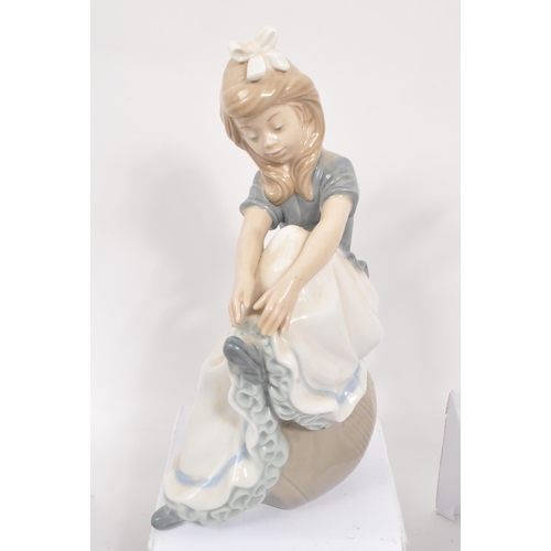 19 - Lladro / Nao - A collection of six 20th century Lladro and NAO porcelain figures. The collection to ... 