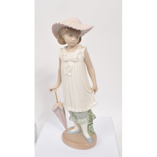 19 - Lladro / Nao - A collection of six 20th century Lladro and NAO porcelain figures. The collection to ... 