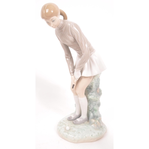 195 - Lladro - A collection of four 20th Century porcelain china Lladro figurines comprising of three golf... 