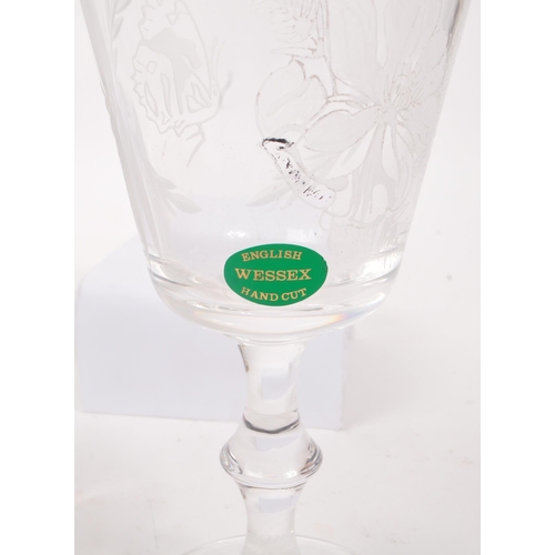 197 - A collection of 20th Century glass items with added hand engravings to include bonbon dish with grap... 