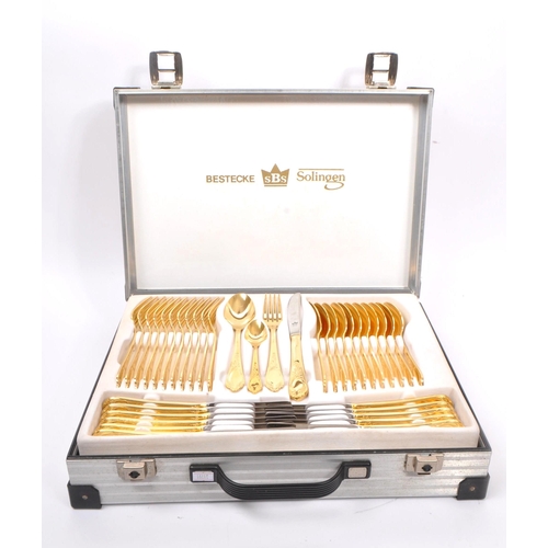 204 - SBS-Bestecke Solingen - A 20th century SBS-Bestecke Solingen 24ct gold plated cutlery canteen set. T... 
