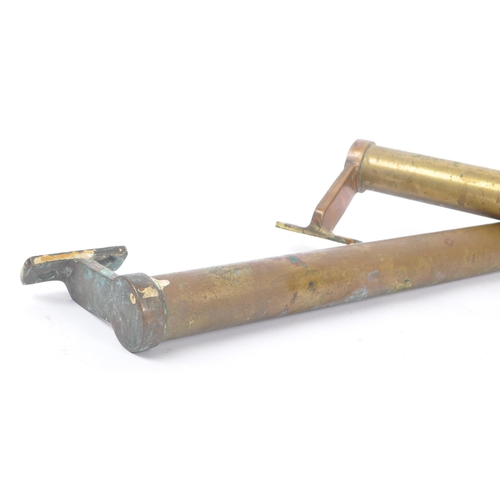 205 - A pair of 19th century brass large door handles. Of circular / cylindrical form with fixings to end.... 