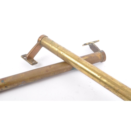 205 - A pair of 19th century brass large door handles. Of circular / cylindrical form with fixings to end.... 