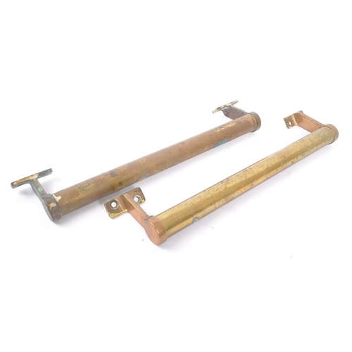 205 - A pair of 19th century brass large door handles. Of circular / cylindrical form with fixings to end.... 