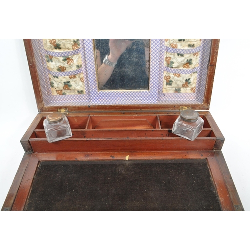 208 - A Victorian 19th Century walnut writing slope box having brass inlaid decoration to top with interio... 