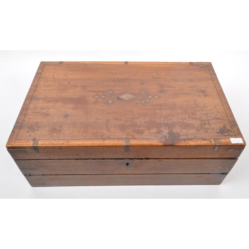 208 - A Victorian 19th Century walnut writing slope box having brass inlaid decoration to top with interio... 