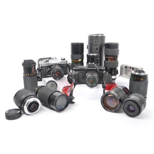 209 - A collection of late 20th century 35mm cameras and lenses. The collection to include Pentax P30N and... 